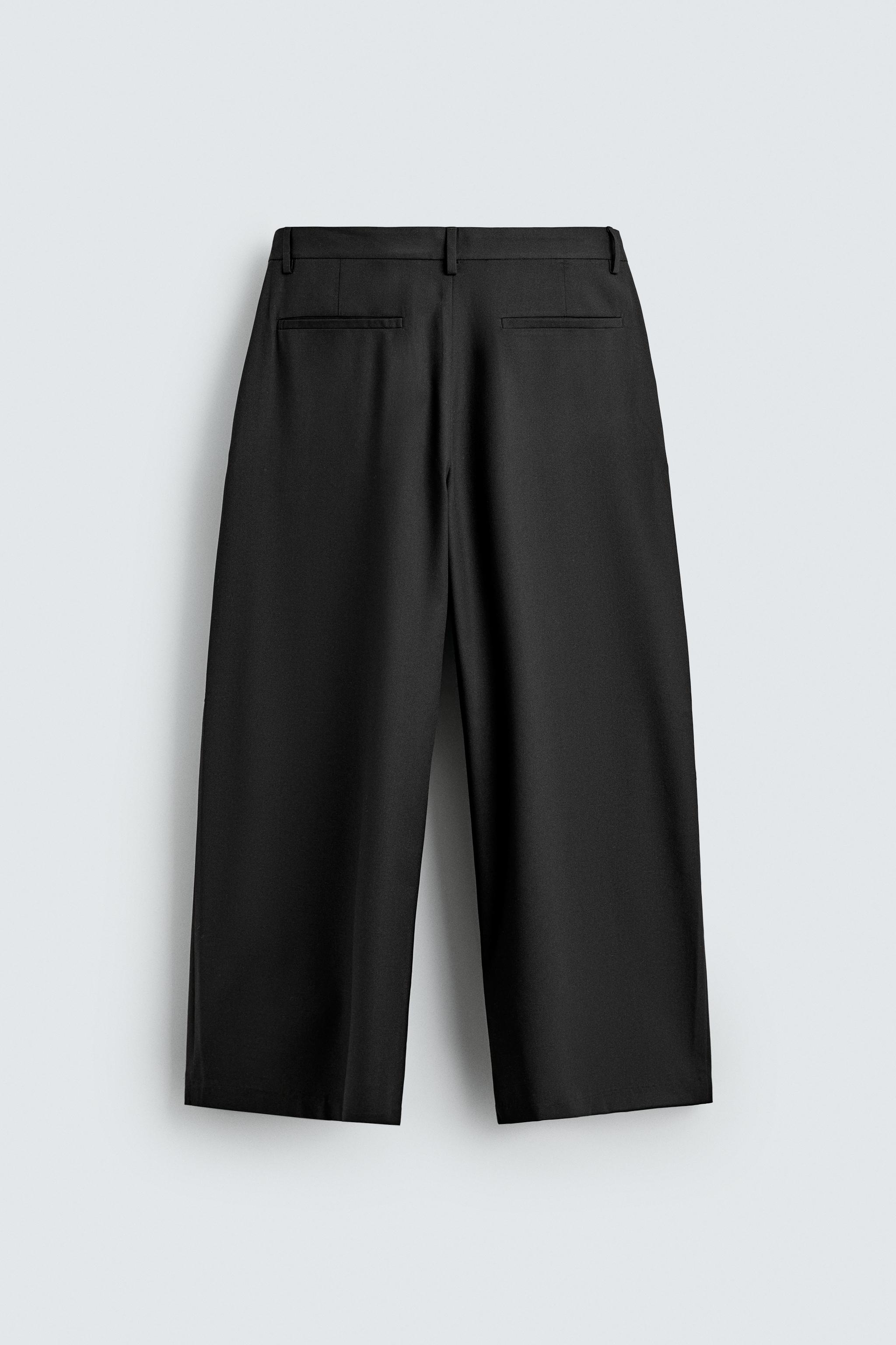 RELAXED FIT PLEATED SUIT PANTS
